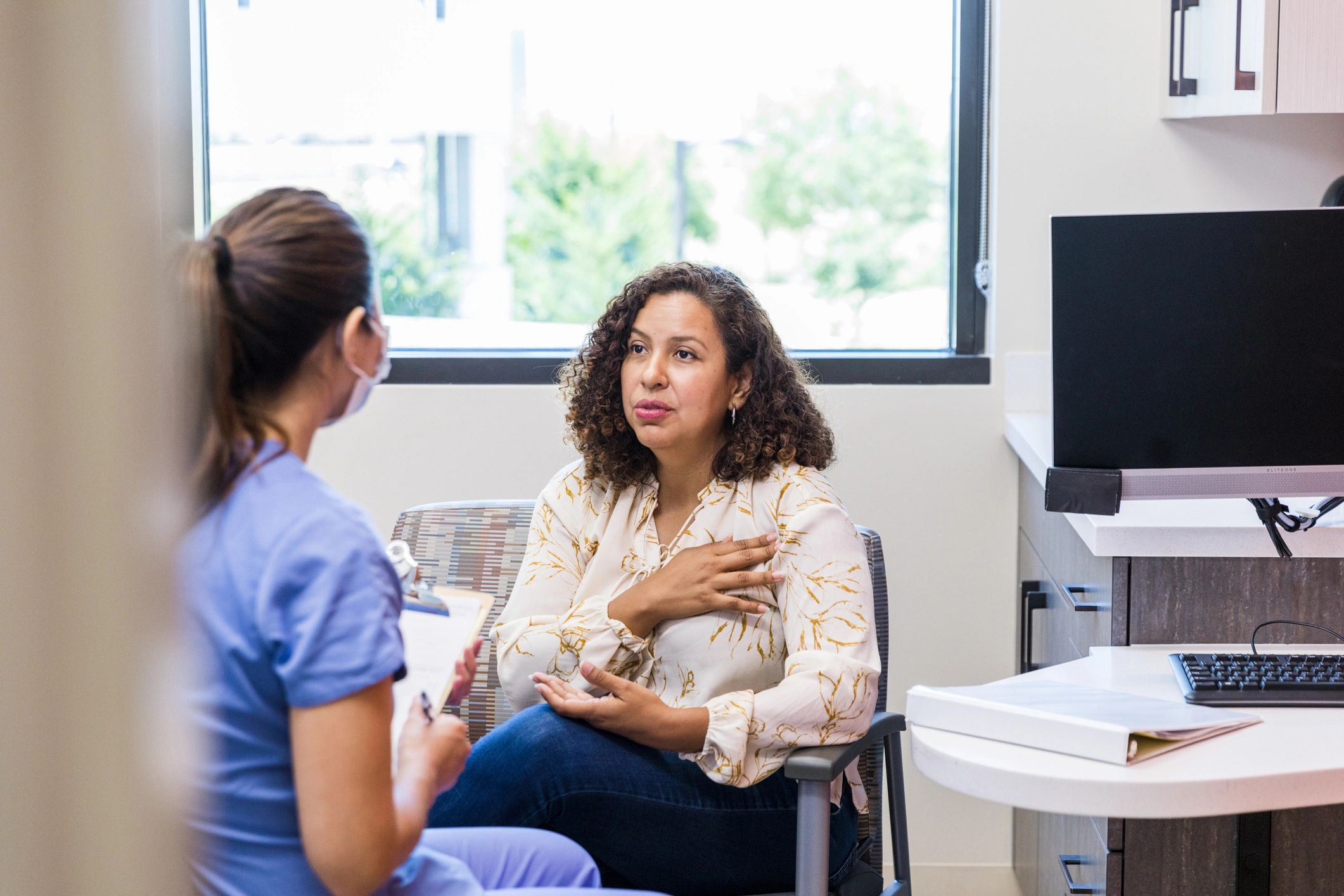 Patient speaking with a healthcare professional